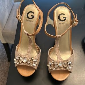 Gold G by guess chunky wooden heel with rhinestone detail. Size 8.5